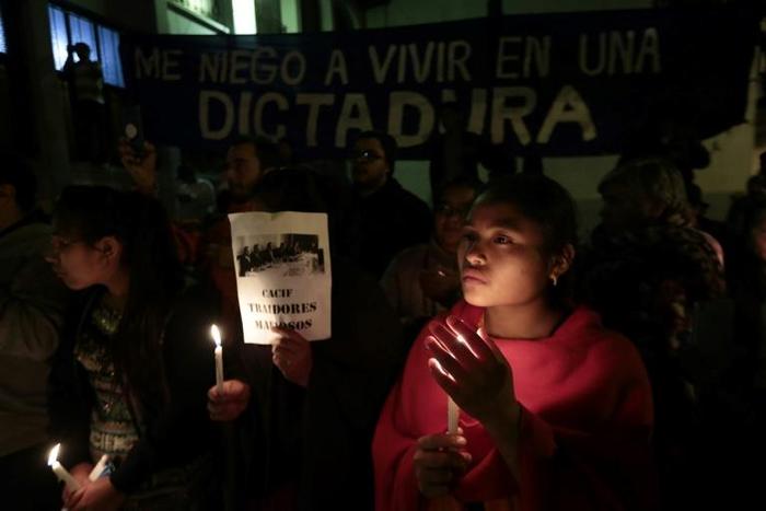 Protesters hold a vigil in support of the UN's anti-corruption mission to Guatemala after President Jimmy Morales tried to shut it down