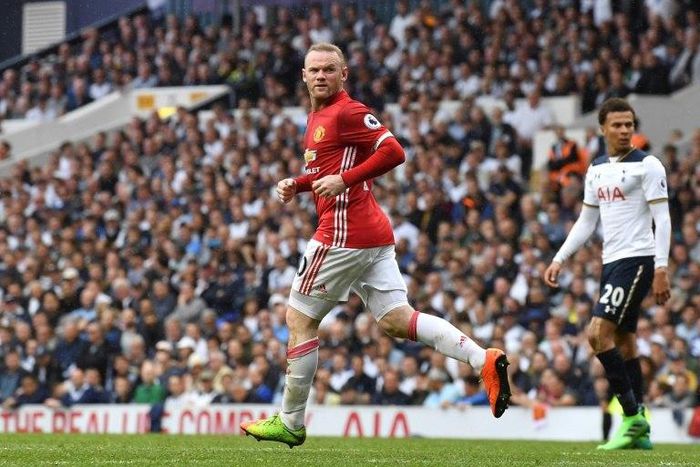 Manchester United striker Wayne Rooney runs back after scoring a goal during the English Premier League match against Tottenham Hotspur at White Hart Lane in London, on May 14, 2017