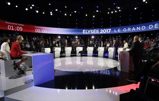The eleven candidates for the French presidential election attend a debate organised by the private TV channels BFM TV and CNews, on April 4, 2017 in La Plaine-Saint-Denis