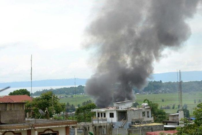 Foreigners are among Islamist gunmen battling security forces in a southern Philippine city, the government said Friday as the reported death toll from four days of clashes climbed to 46