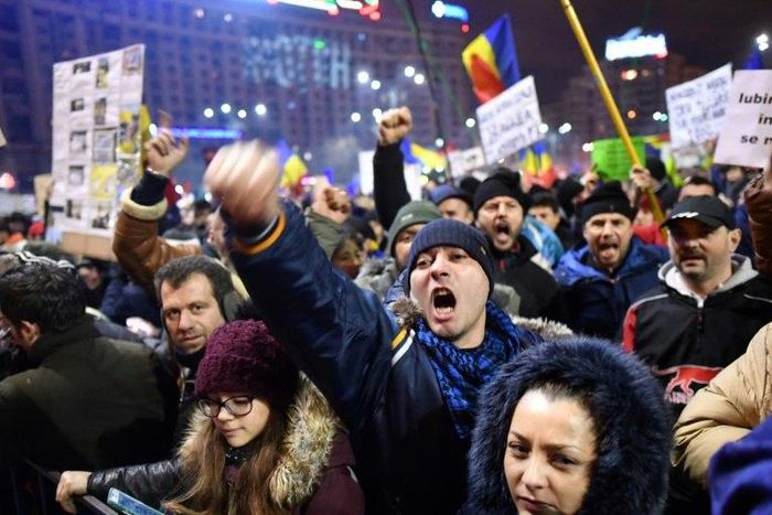 Protesters have taken to the streets in Romania for six straight nights over the government's contentious corruption legislation