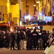 Police,firefighters and rescue workers secure the area near the Bataclan concert hall in central Paris, following a series of coordinated attacks