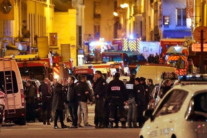 Police,firefighters and rescue workers secure the area near the Bataclan concert hall in central Paris, following a series of coordinated attacks