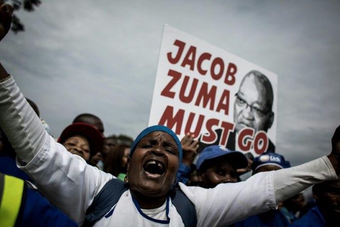 Democratic Alliance (DA) party supporters attend hold a protest march against South African president Jacob Zuma in Johannesburg on April 7, 2017