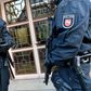 Armed police secured the entrance to the Higher Regional Court in Celle near Hanover, northern Germany, on January 26, 2017