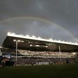A rainbow appears over the stadium during the closing ceremony at White Hart Lane in London, on May 14, 2017