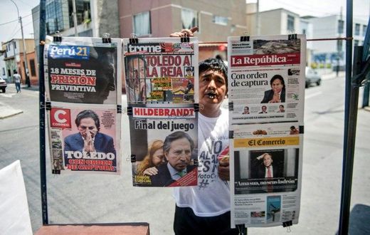 Newspapers with the portrait of former Peruvian President (2001-2006) Alejandro Toledo on their front pages, are displayed for sale in Lima on February 10, 2017