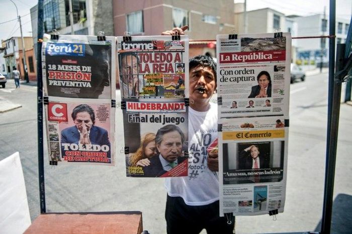 Newspapers with the portrait of former Peruvian President (2001-2006) Alejandro Toledo on their front pages, are displayed for sale in Lima on February 10, 2017