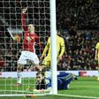 Manchester United's midfielder Juan Mata (R) celebrates after scoring the opening goal during the UEFA Europa League round of 16 second-leg football match against FC Rostov at Old Trafford stadium in Manchester, on March 16, 2017