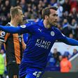 Leicester City's defender Christian Fuchs celebrates after scoring their first goal during the English Premier League football match against Hull City March 4, 2017