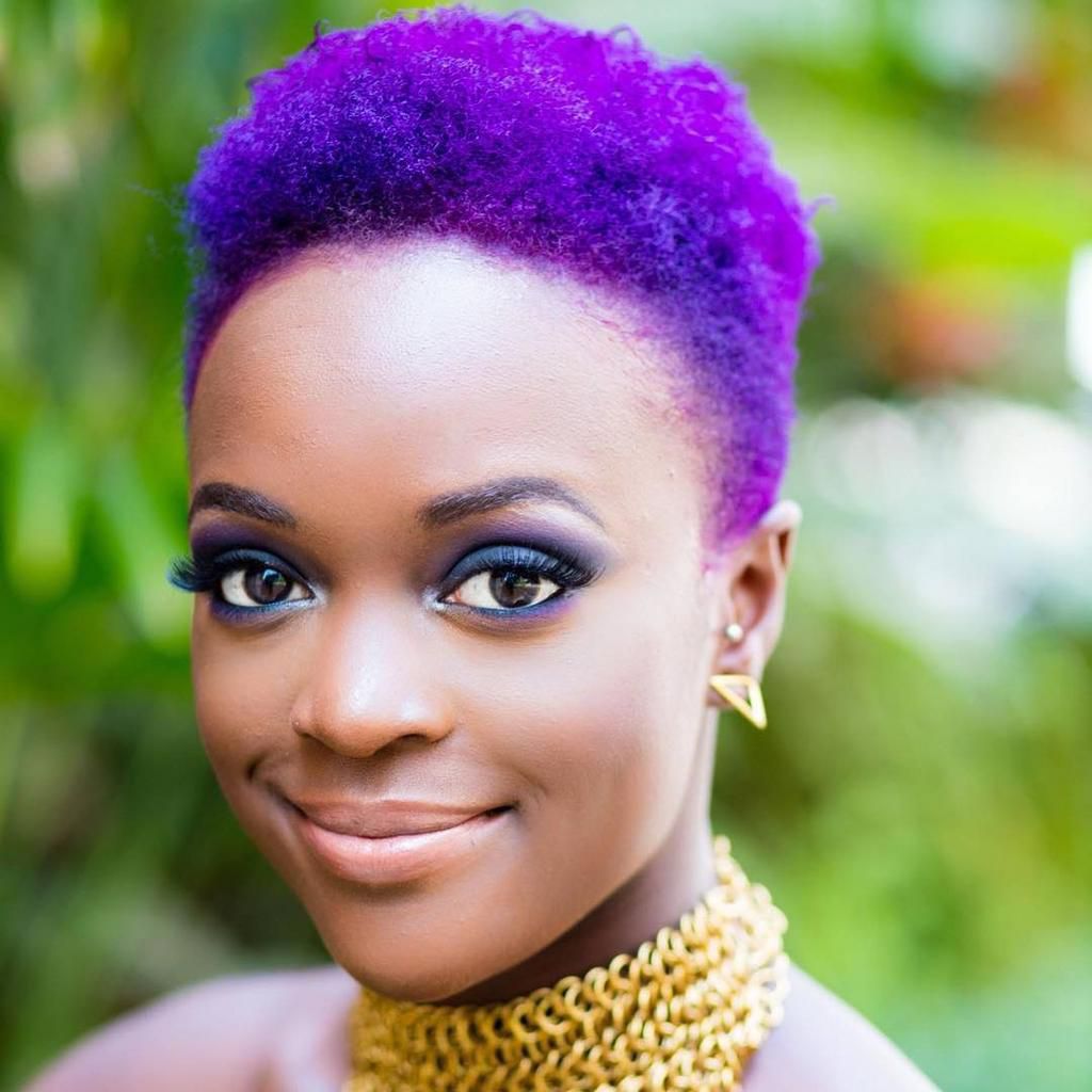 Kenyan photographer Lyra Aoko rocking purple hair (Instagram lyraaoko)