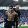Roberto Firmino (L) celebrates scoring the winner for Liverpool with Philippe Coutinho who got the crucial equaliser against Stoke City