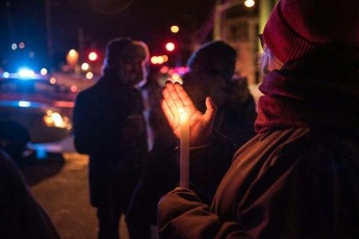 People come to show their support for the victims after an attack at a mosque in the Québec City Islamic cultural center on January 29, 2017