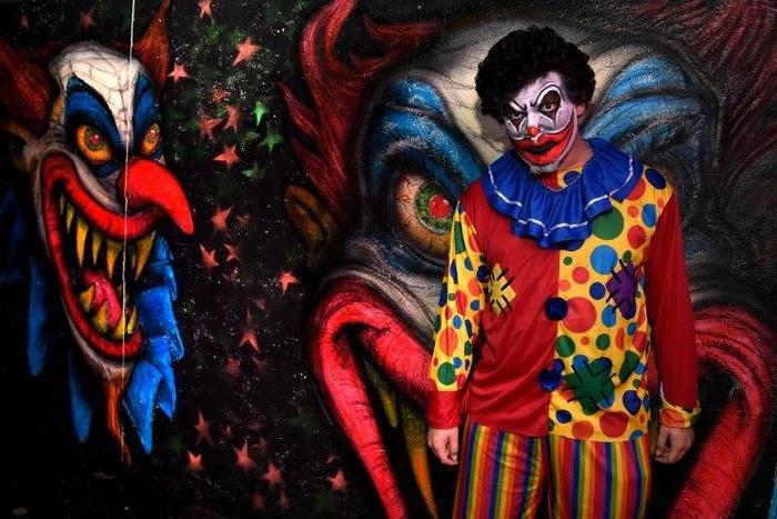Armando Santana, who performs as a scary clown in a haunted house in Miami, Florida, says he no longer wears his costume in public after "creepy clown" sightings spread across the US