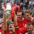 Steven Gerrard lifts the FA Cup after Liverpool beat West Ham 3-1 on penalties during the FA Cup final at the Millennium Stadium in Cardiff, on May 13, 2006