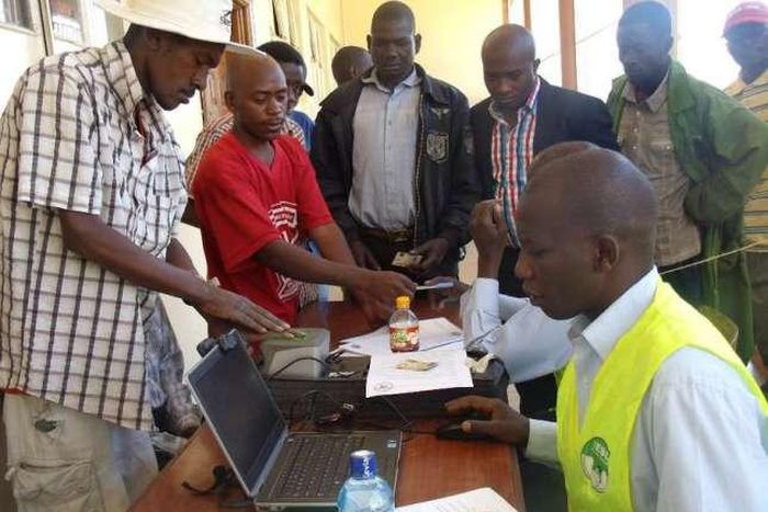 An Independent Electoral and Boundaries Commission official registers voters in Eldoret town.
