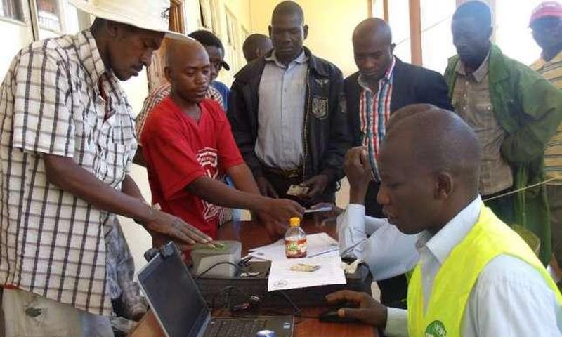 An Independent Electoral and Boundaries Commission official registers voters in Eldoret town.