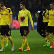 Dortmund's players react after their UEFA Champions League 1st leg quarter-final football match against Monaco in Dortmund, western Germany on April 12, 2017