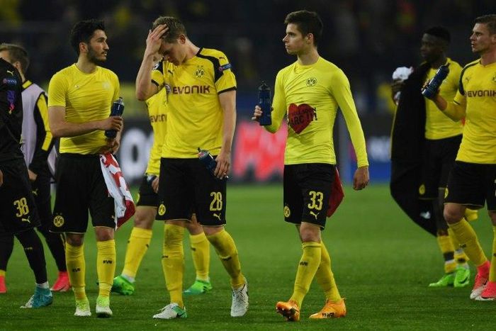 Dortmund's players react after their UEFA Champions League 1st leg quarter-final football match against Monaco in Dortmund, western Germany on April 12, 2017