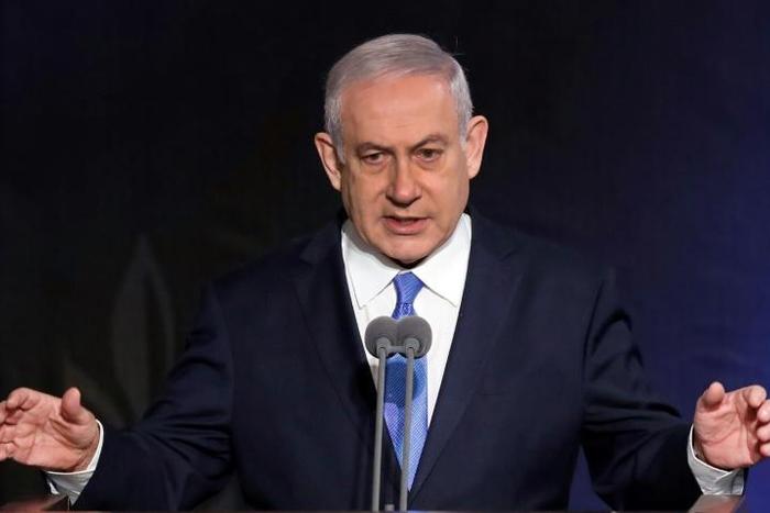 Israeli Prime Minister Benjamin Netanyahu speaks during a handover ceremony for the new chief of staff on January 15, 2019 in Tel Aviv