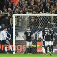 Lyon's Emanuel Mammana (L) scores a late goal during their match against Bordeaux on March 3, 2017