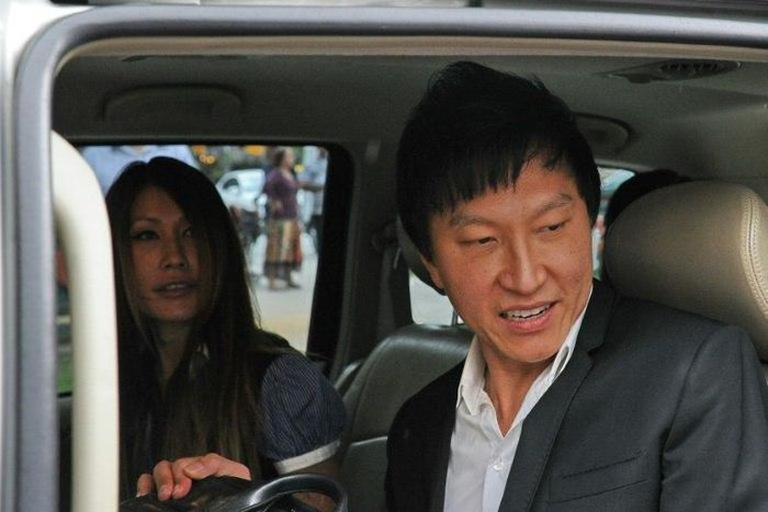 Singapore prosecutors are seeking a review of a court ruling which slashed the jail term of a showbiz pastor Kong Hee (R) who misused millions in church funds to promote his wife Ho Yeow Sun (L)'s music career, amid public outcry