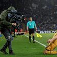 Tottenham Hotspur's Harry Kane (R) celebrates scoring his third goal during their English Premier League football match against Leicester City at King Power Stadium in Leicester, central England on May 18, 2017