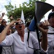 Supporters of opposition candidate Guillermo Lasso gather in front of the National Electoral Council in Guayaquil, Ecuador on April 3, 2017