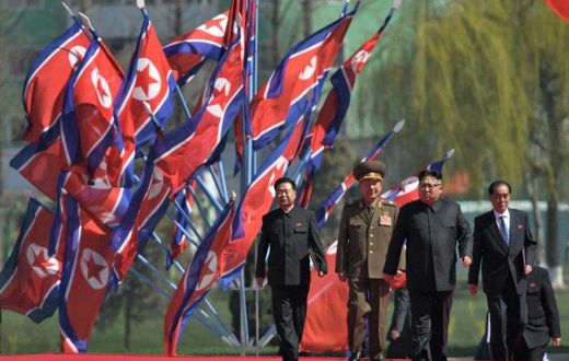 Tens of thousands of soldiers, officials and citizens packed a plaza to await leader Kim Jong-Un's arrival