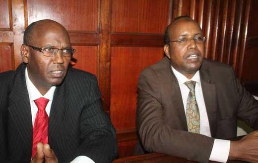 Former NYS Deputy Director General Adan Harakhe (right) with former Devolution and Planning ministry administrator Hassan Noor Hassan in a Nairobi court on November 28, 2016.