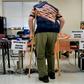 A man checks-in at the Activity Center at Bohrer Park during early voting on October 28, 2016 in Gaithersburg, Maryland