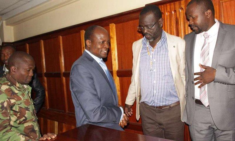 Migori Governor Okoth Obado his co-accused Caspal Obiero and Michael Oyamo