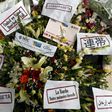 Flowers and messages of condolences are laid outside Tunisia's Bardo National Museum on March 24, 2015 in Tunis, six days after it witnessed an attack which killed 21 people