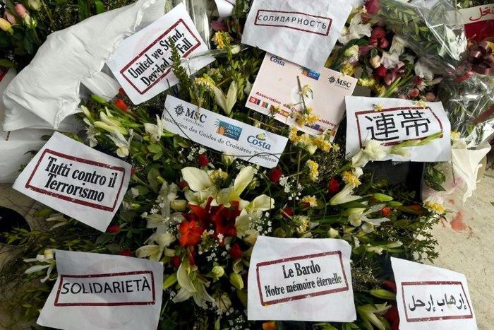 Flowers and messages of condolences are laid outside Tunisia's Bardo National Museum on March 24, 2015 in Tunis, six days after it witnessed an attack which killed 21 people