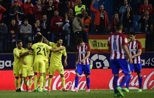 Villarreal's players celebrate after midfielder Roberto Soriano scored during the Spanish league football match against Atletico Madrid April 25, 2017