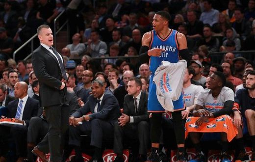 Head coach Billy Donovan of the Oklahoma City Thunder and Russell Westbrook react during the game against the New York Knicks at Madison Square Garden on November 28, 2016