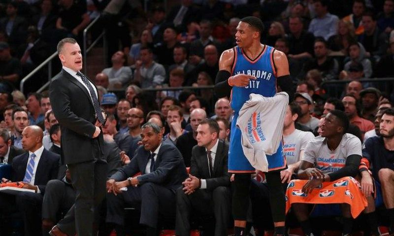 Head coach Billy Donovan of the Oklahoma City Thunder and Russell Westbrook react during the game against the New York Knicks at Madison Square Garden on November 28, 2016
