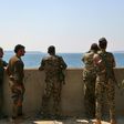 Members of the US-backed Syrian Democratic Forces stand on the Tabqa dam partially recaptured during their drive on the Islamic State group's stronghold in nearby Raqa