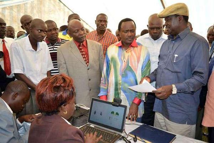 Cord leaders Raila Odinga (right) and Kalonzo Musyoka inspect an IEBC registration centre at Jomo Kenyatta Sports Grounds in Kisumu.