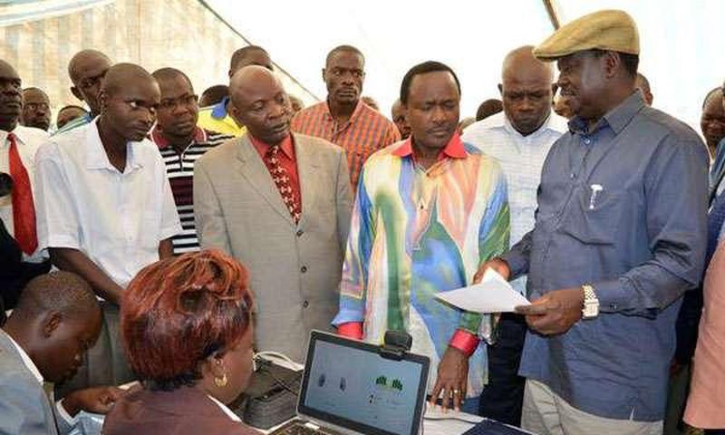 Cord leaders Raila Odinga (right) and Kalonzo Musyoka inspect an IEBC registration centre at Jomo Kenyatta Sports Grounds in Kisumu.