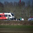 Emergency personnel work at the scene of a train crash on March 27, 2017 near Harlingen, northern Netherlands