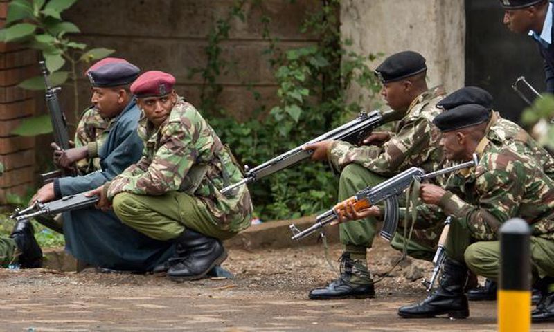 Kenyan police officers during a past stake out (Twitter)