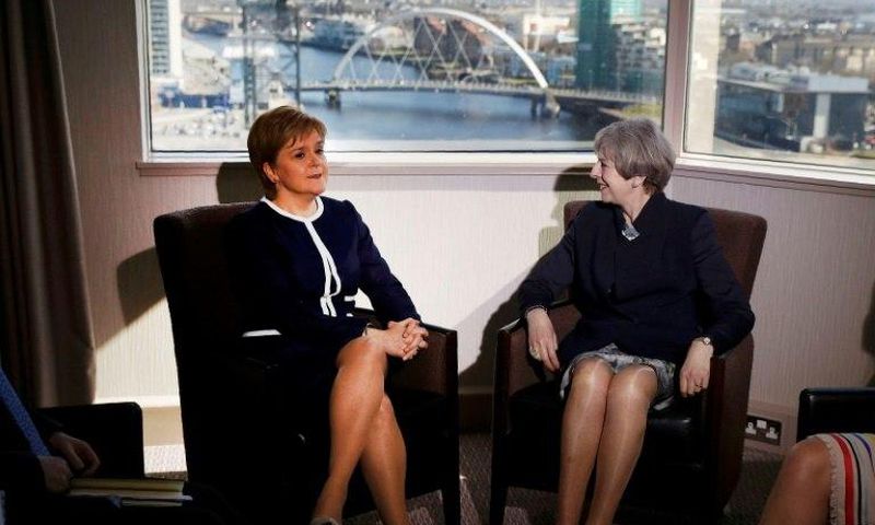 Britain's Prime Minister Theresa May (R) and Scotland's First Minister Nicola Sturgeon pose ahead of their meeting in a Glasgow hotel on Monday, but their talks failed to bridge the divide over Scottish independence