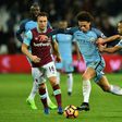 Manchester City's midfielder Leroy Sane (C) vies with West Ham United's midfielder Mark Noble (L) and defender Winston Reid during the English Premier League football match between February 1, 2017