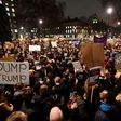 A crowd in London chanted "Shame on you Theresa May"