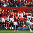 Swansea City's Gylfi Sigurdsson (R) scores from a free kick to equalise 1-1 against Manchester United at Old Trafford on April 30, 2017