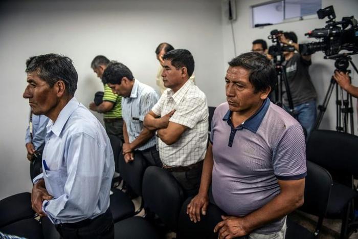 Retired Peruvian military officers appear in court to face charges of rape