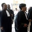 Jacqueline Moudeina (C) and Assane Dilma Ndiaye (R), lawyers of the plaintiffs in the case of former Chadian dictator Hissene Habre, arrive to the Appeal Court of the Extraordinary African Chambers (CAE) on April, 27, 2017 in Dakar