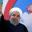 Iranian President Hassan Rouhani gestures to the camera after registering to run for re-election at the interior ministry in Tehran on April 14, 2017