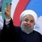 Iranian President Hassan Rouhani gestures to the camera after registering to run for re-election in Tehran on April 14, 2017